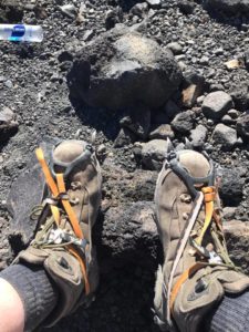 Crampons on, getting ready to climb the snow on Mt. Adams
